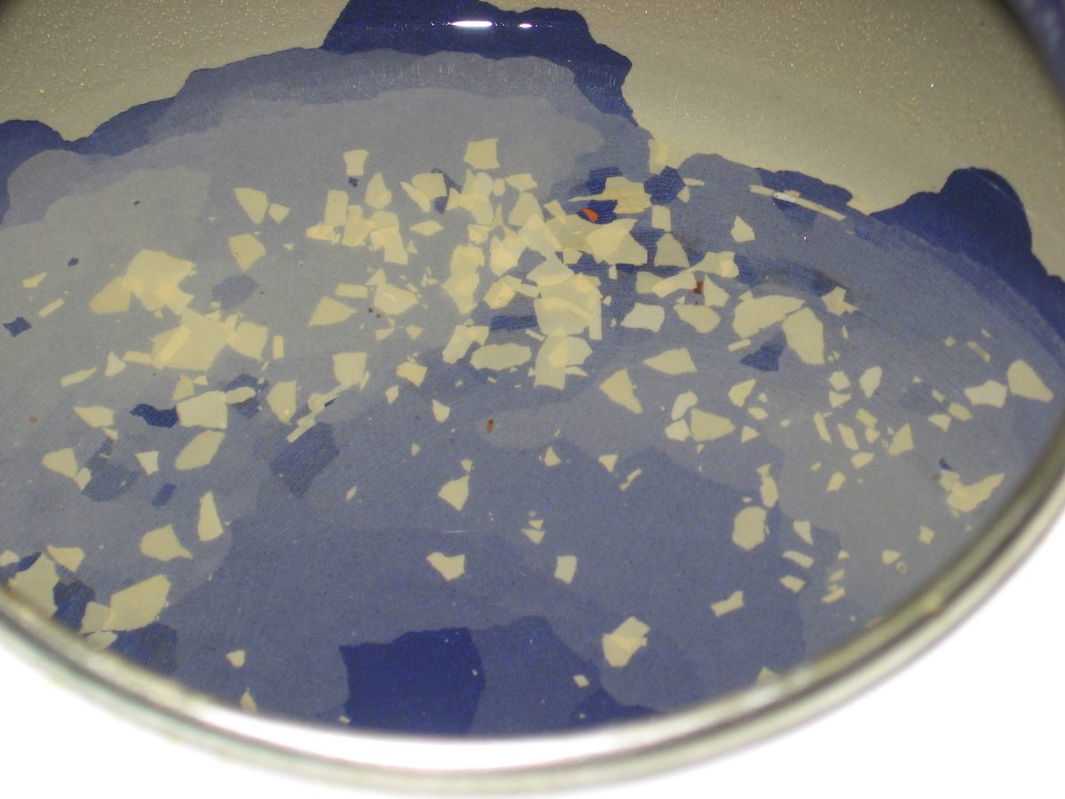 Limescale flakes in the bottom of a kettle